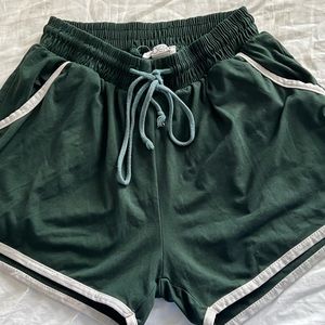 green athletic shorts